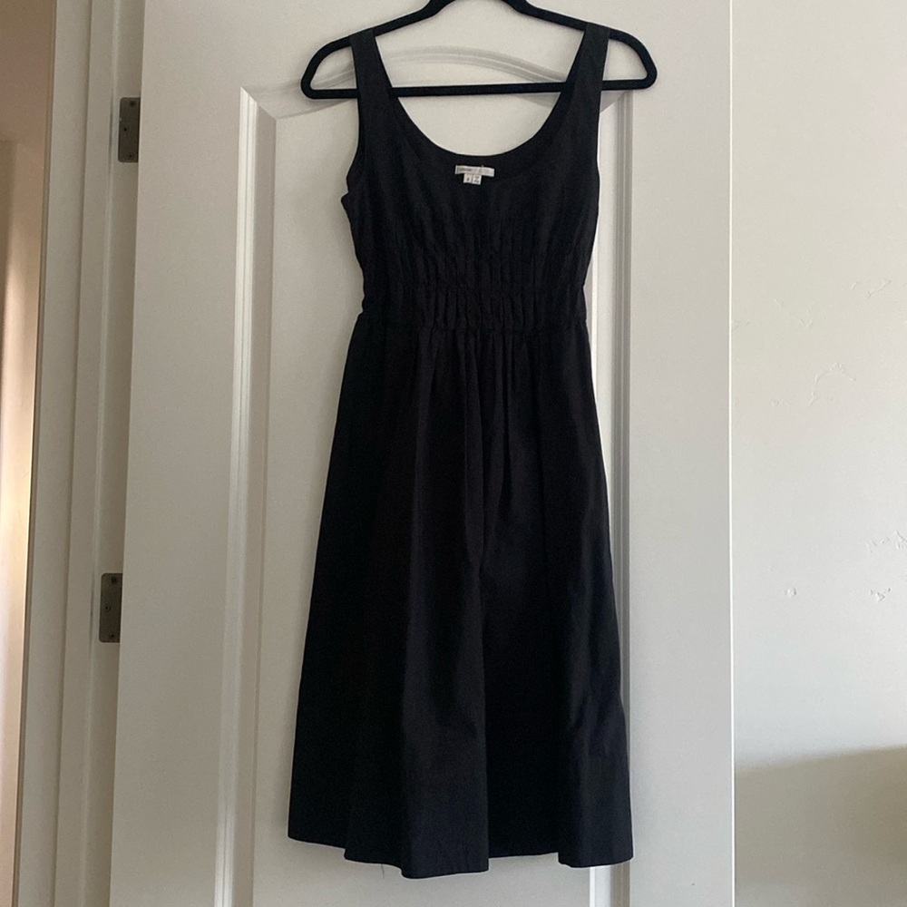 Vince cotton midi length dress. Detailed bodice. Pockets.